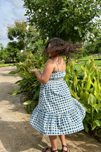 Ira checked midi dress with flared tiered hem in motion