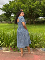Mira midi dress with puff sleeves and gathered waist