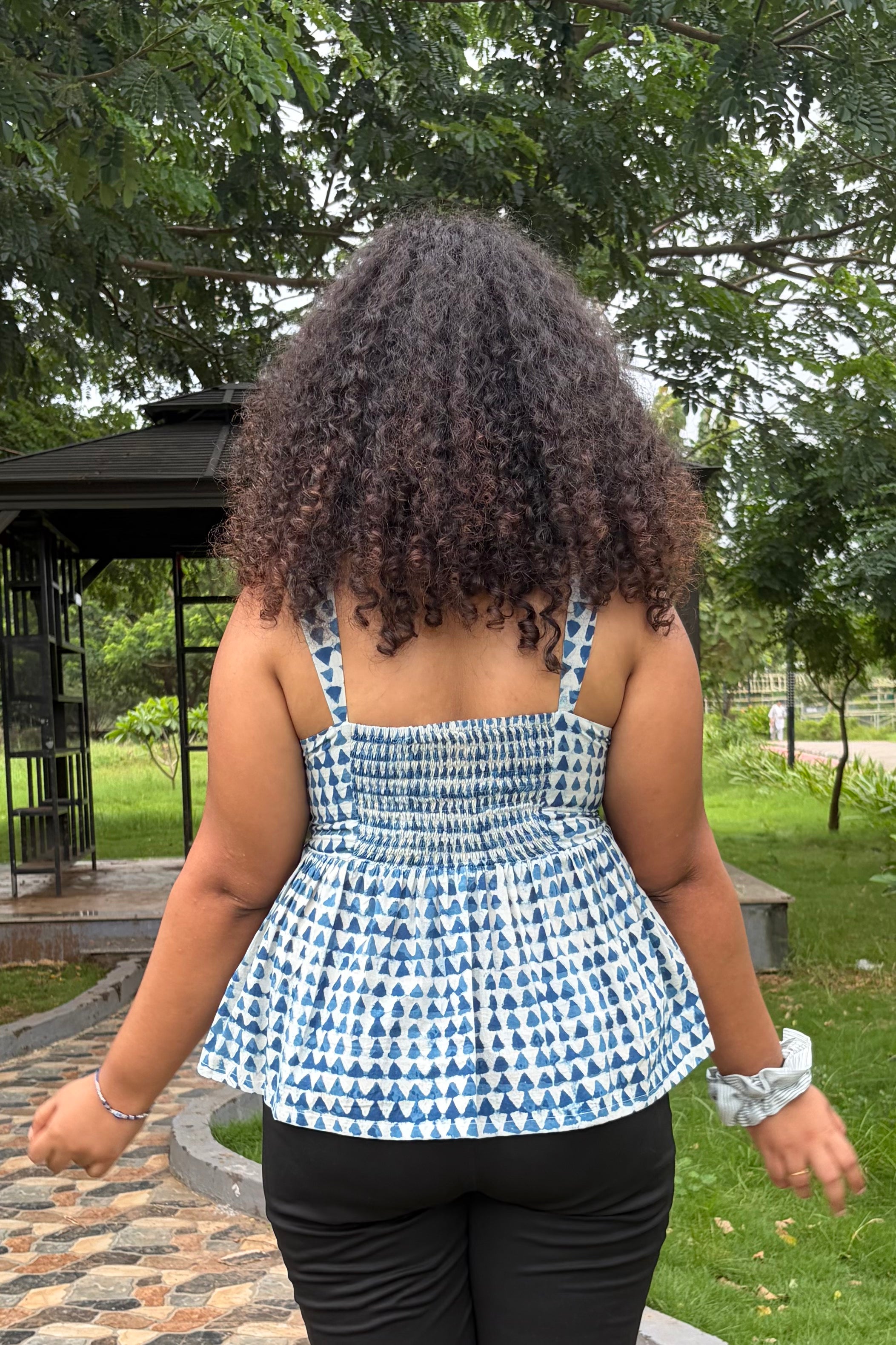 Sia peplum top back smocking detail 