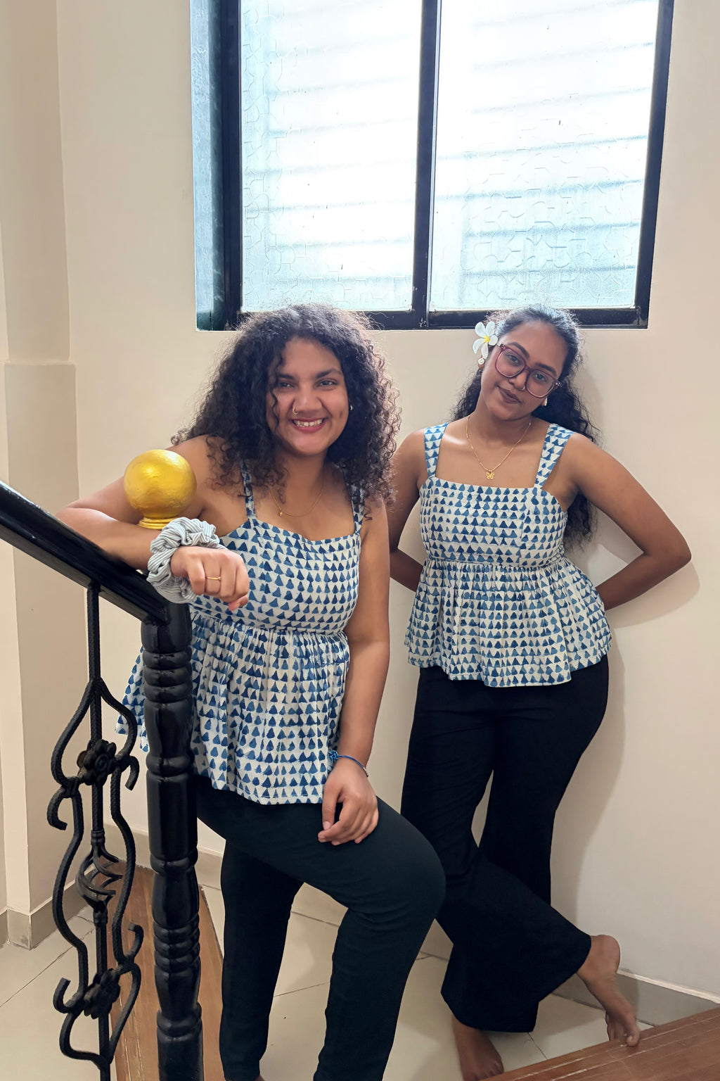 Sia peplum top shown on two models in different sizes