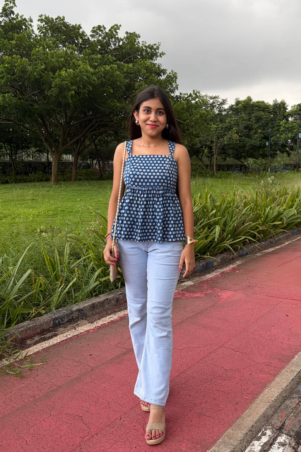 Tia indigo peplum top styled with denim