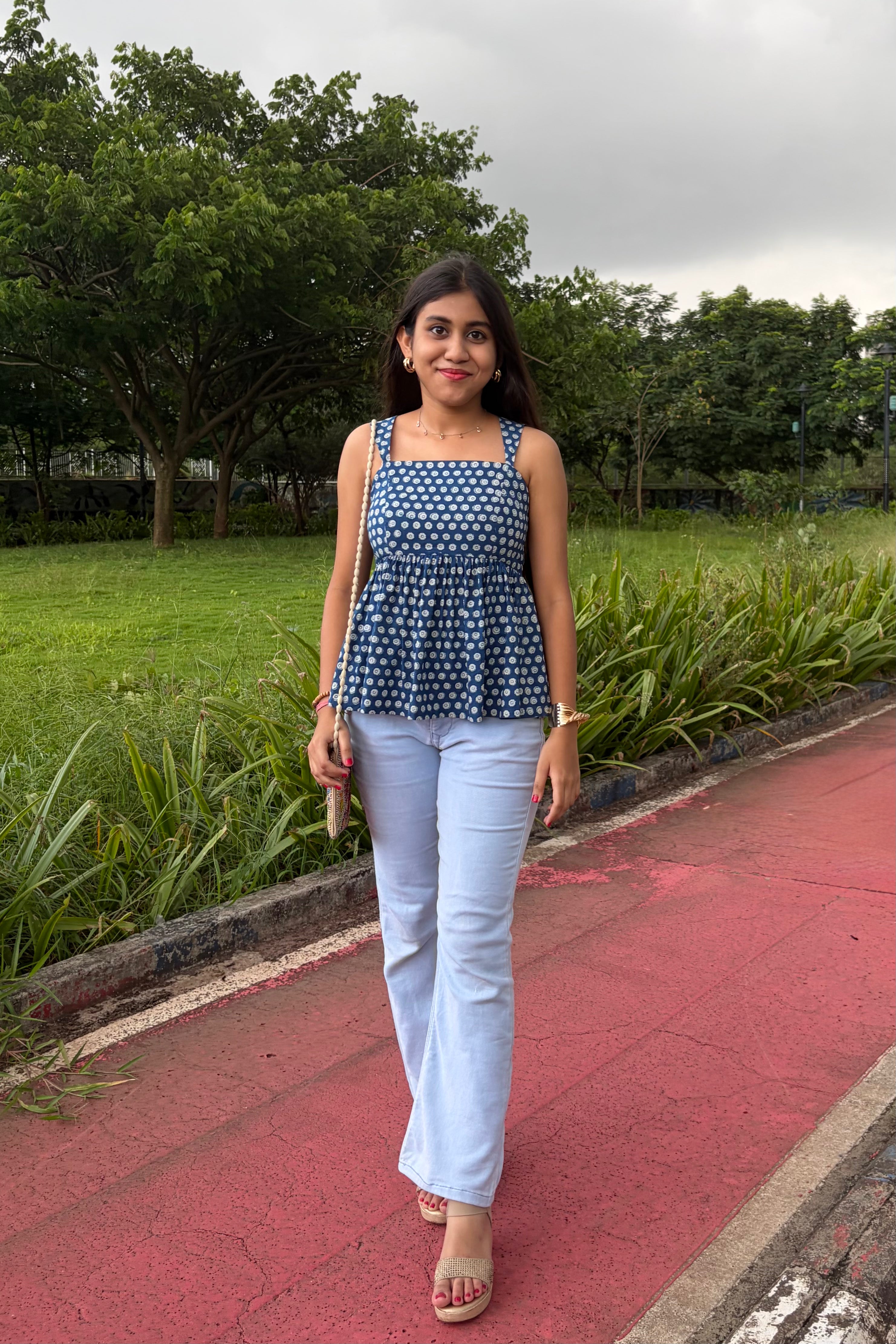 Tia indigo peplum top styled with denim